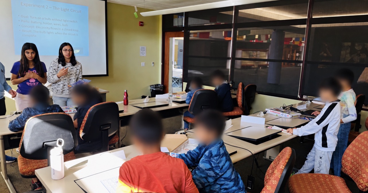 STEMSpark leaders teaching students