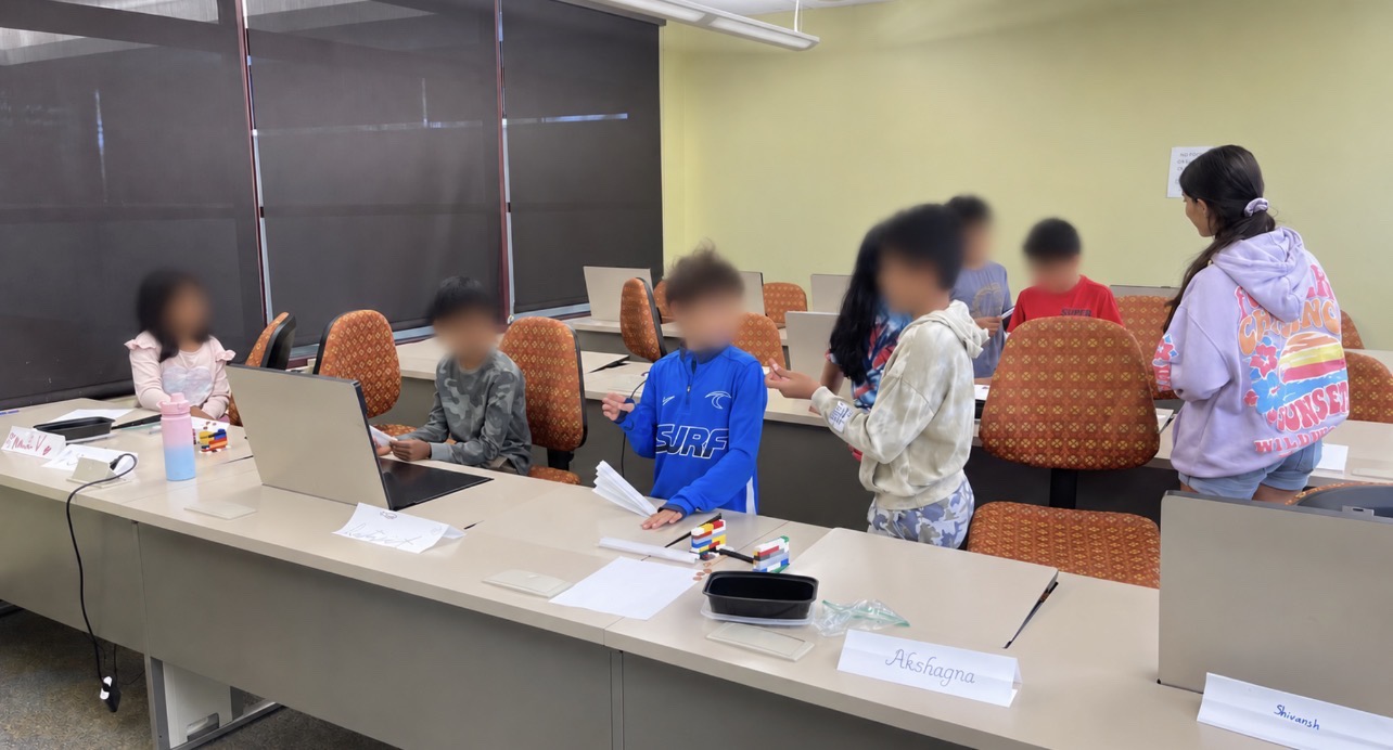 Students collaborating during STEMSpark