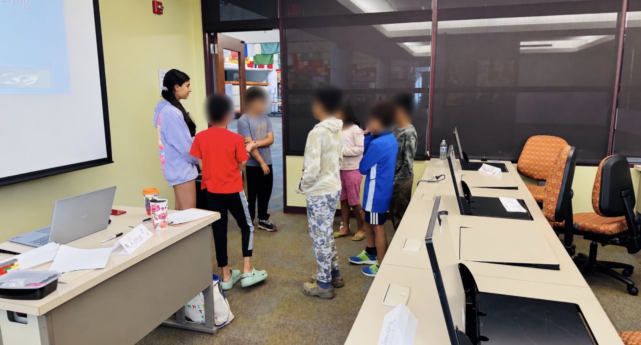 Students discussing a STEMSpark activity